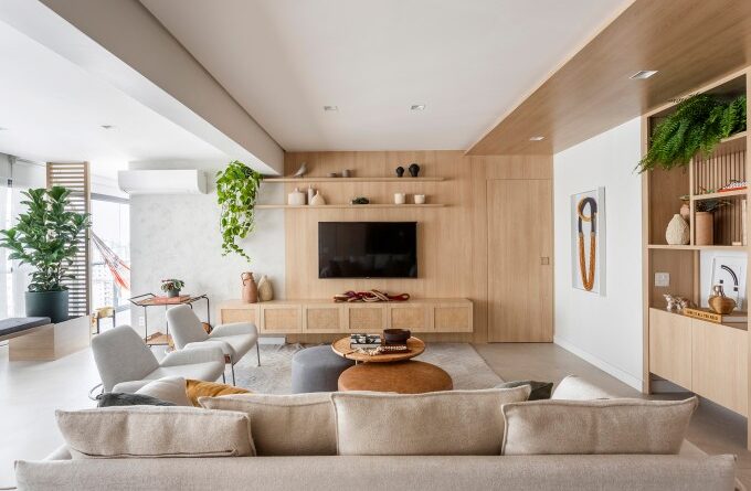 Apartamento ganha canto zen com rede de balanço e chão de pedriscos